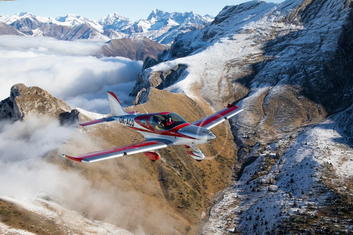 Bristell B23 head-on over the mountains