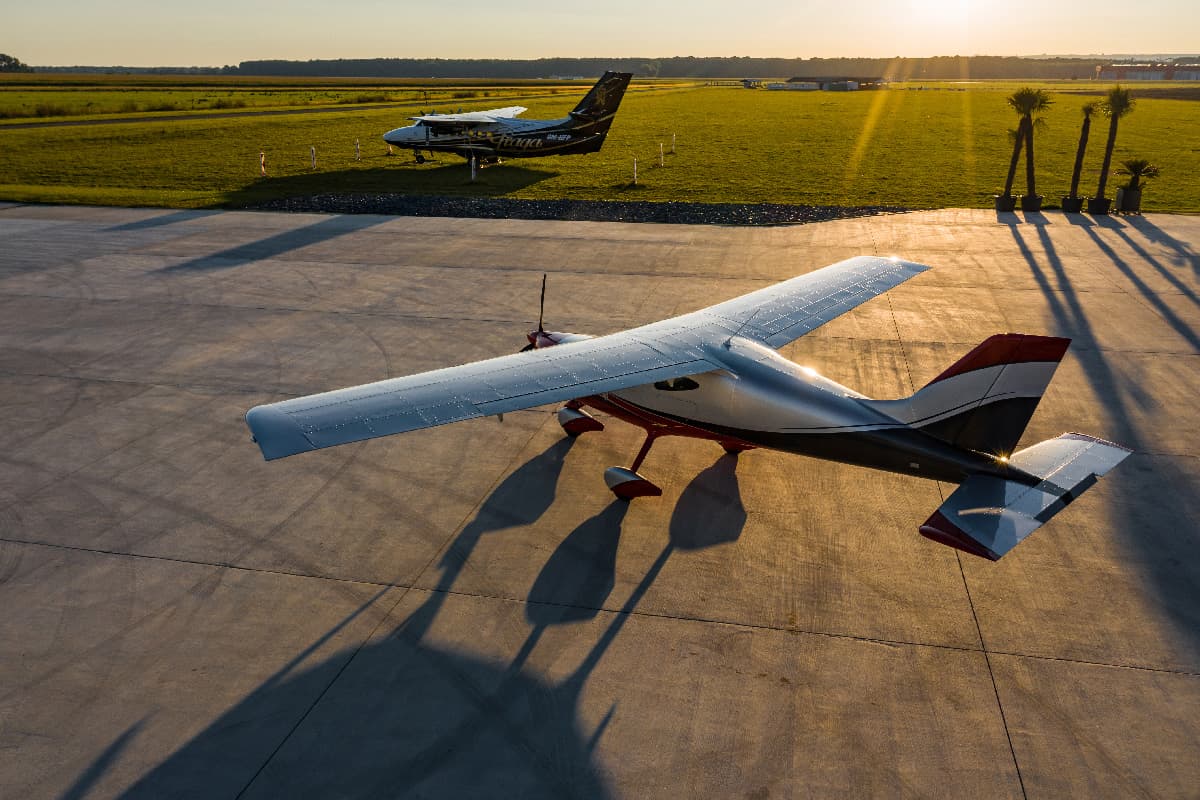 Aerial view of the Bristell B8 on the apron at sunset