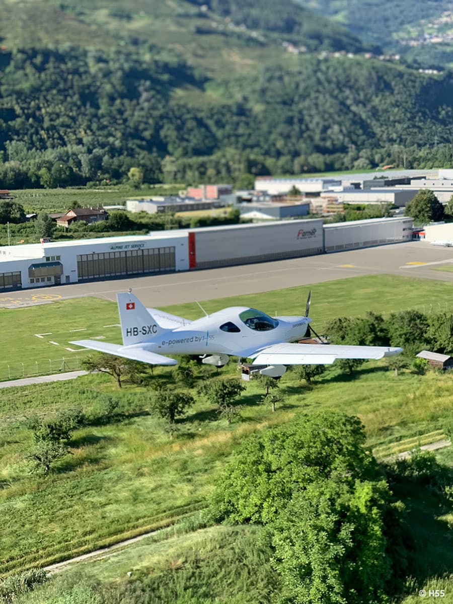 Bristell Energic in a low pass over a Swiss airfield