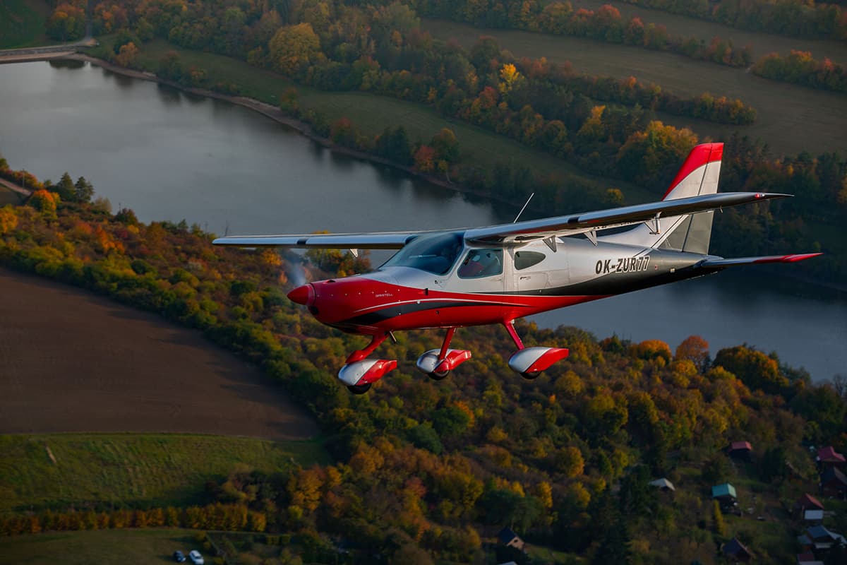 Bristell B8 in flight showing its fixed tricycle landing gear